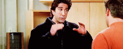 Ross de Friends pedindo silêncio.